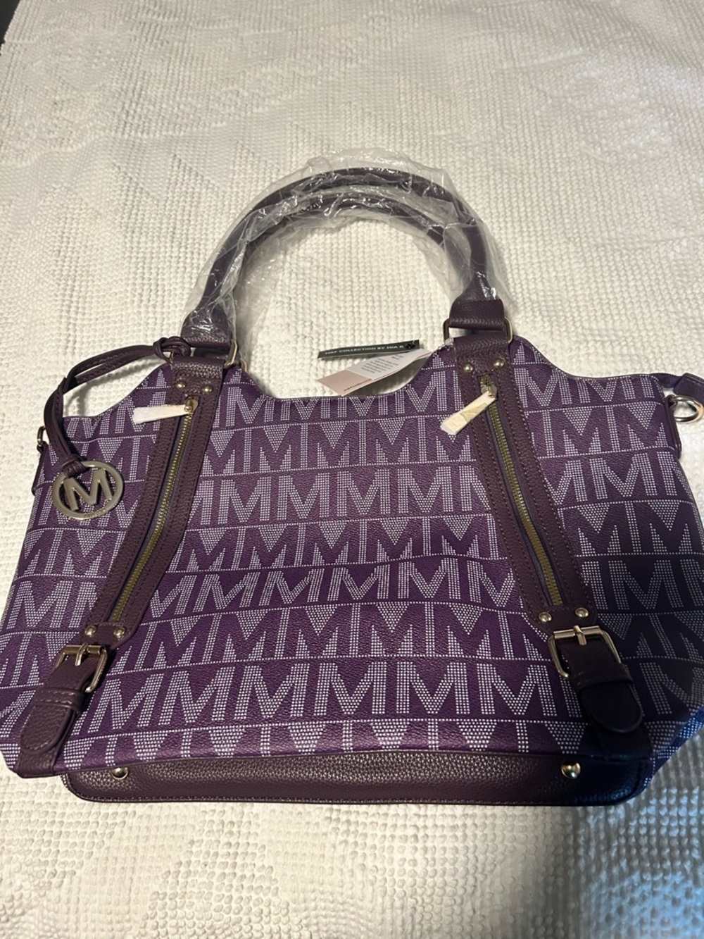 MKF purple purse brand new.